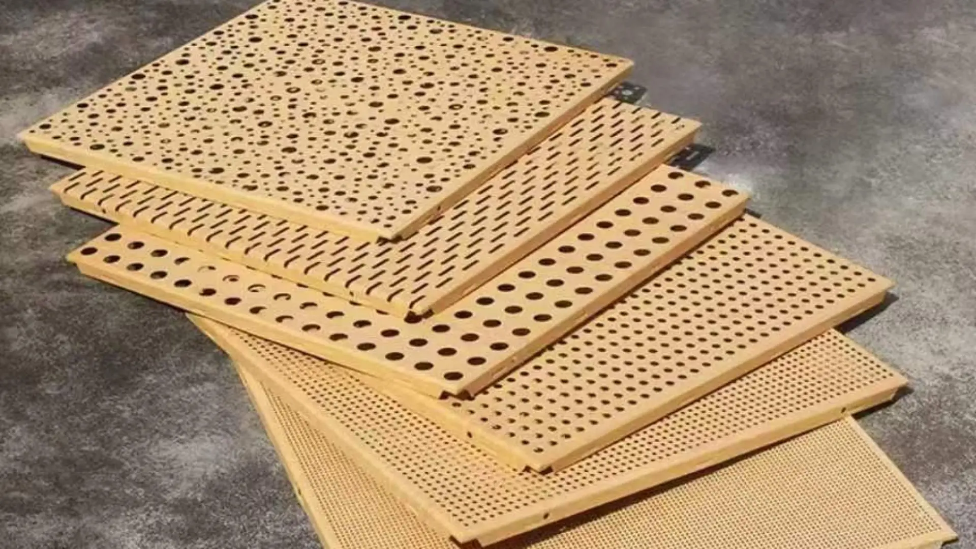 Custom perforated aluminum ceiling panels with various decorative hole patterns, architectural metal ceiling for interior space