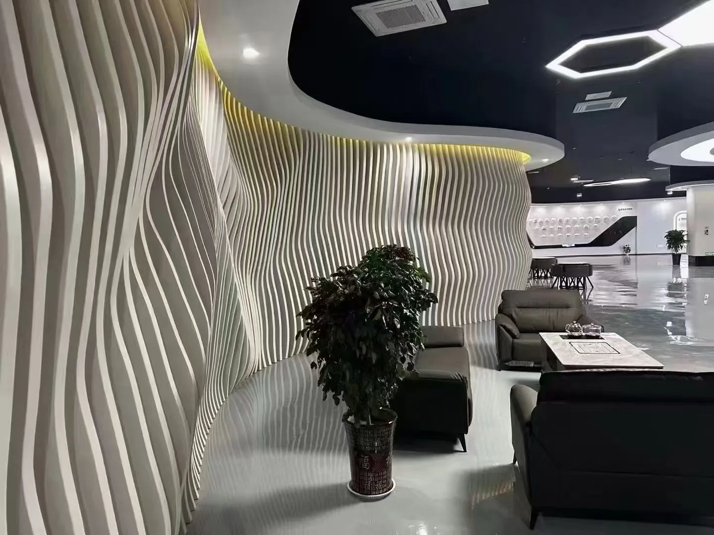 Curved aluminum strip facade applications in various building types Curved aluminum strip facade applications in various building types