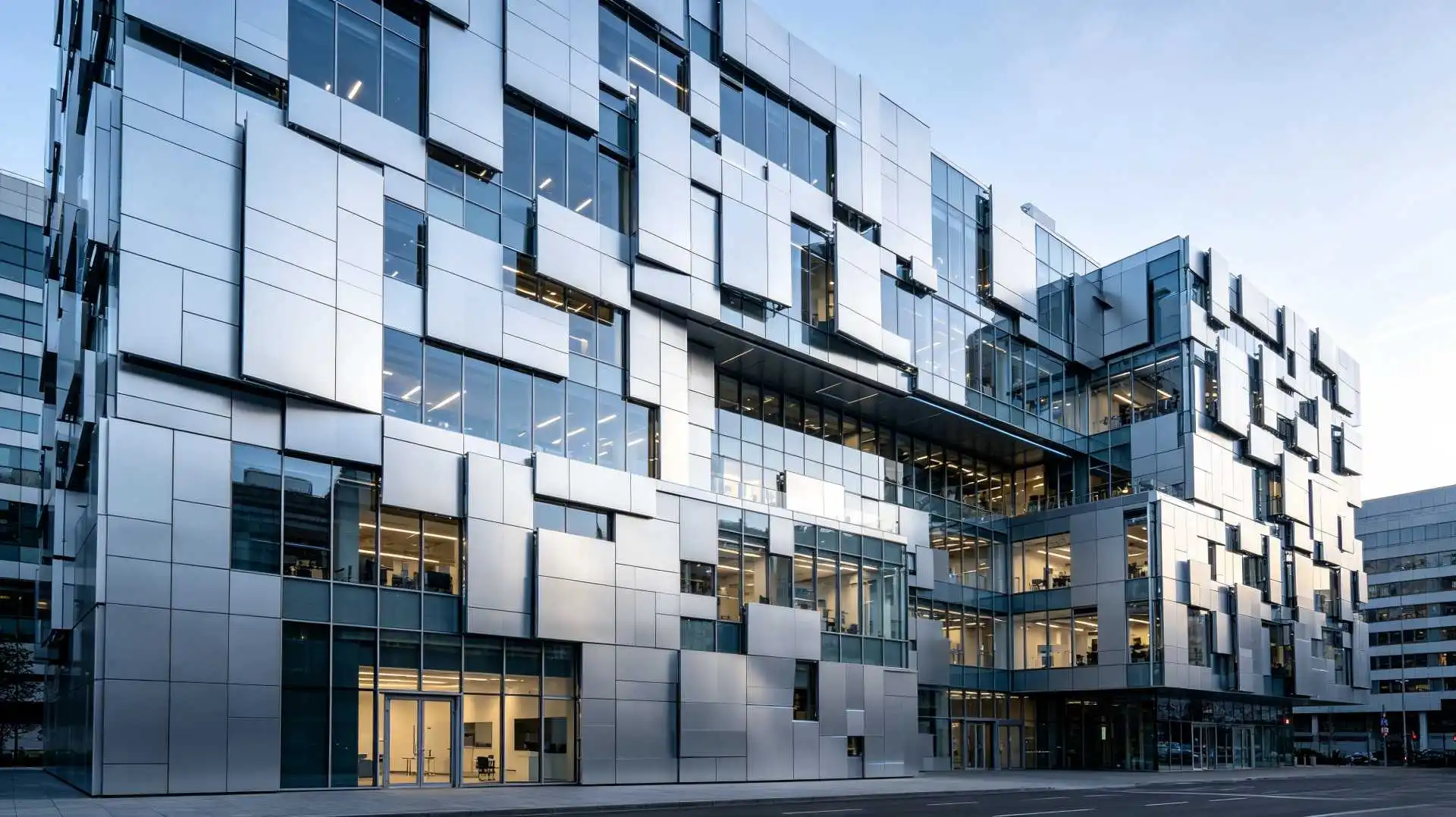 Tech-inspired aluminum curtain wall on modern office building facade Tech-inspired aluminum curtain wall on modern office building facade