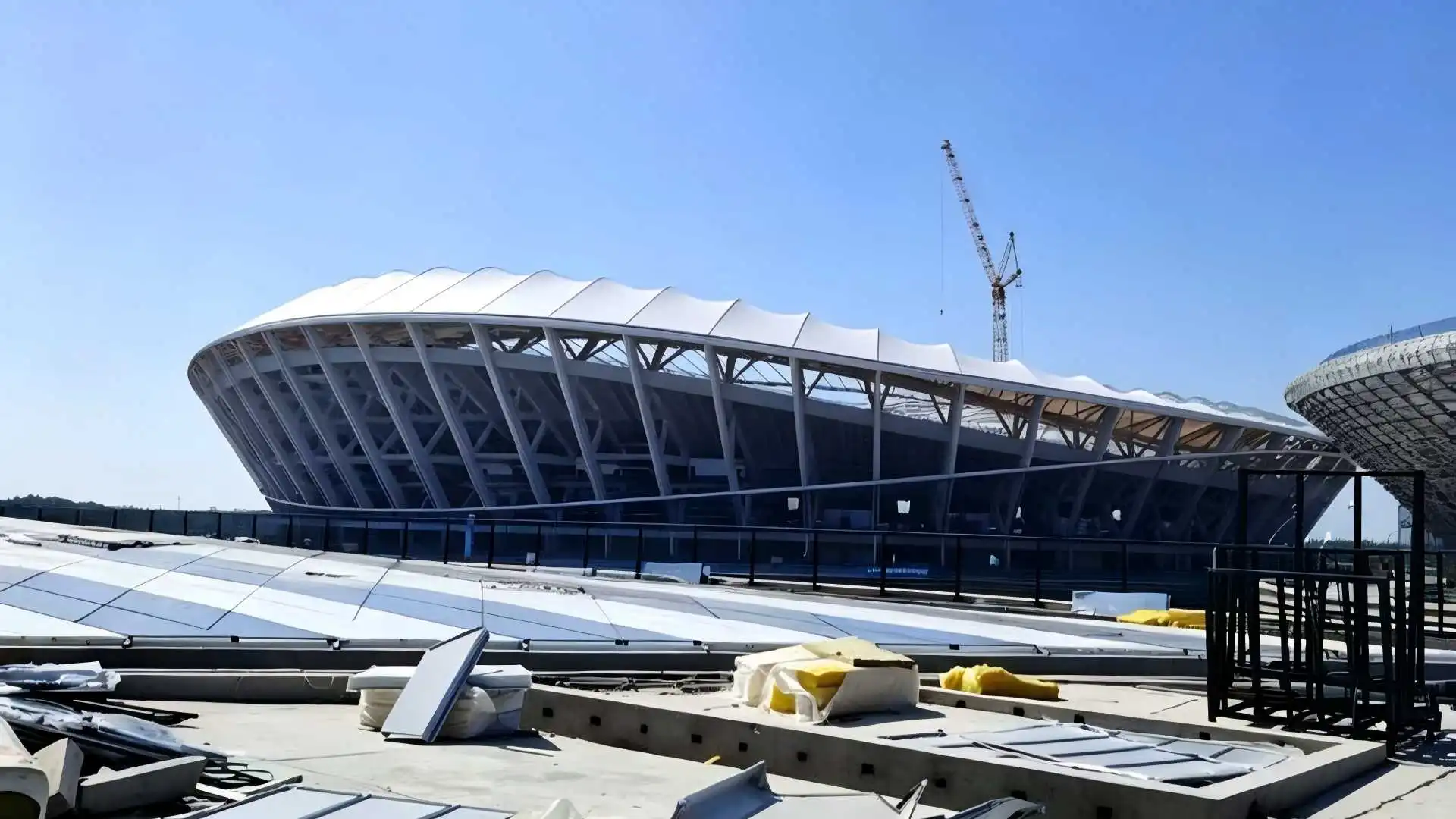 Construction of Large Hyperbolic Aluminum Panels for Stadium Exterior Facade