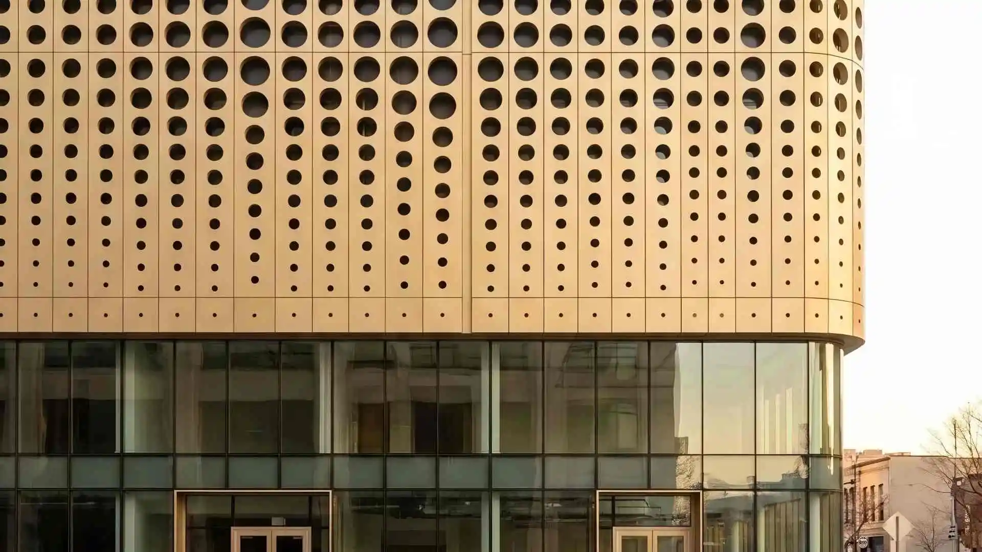 Gradient perforated aluminum panel storefront facade, custom punched aluminum sheet with gradually changed hole size, powder coated aluminum cladding for entrance signage, architectural decorative metal panel
